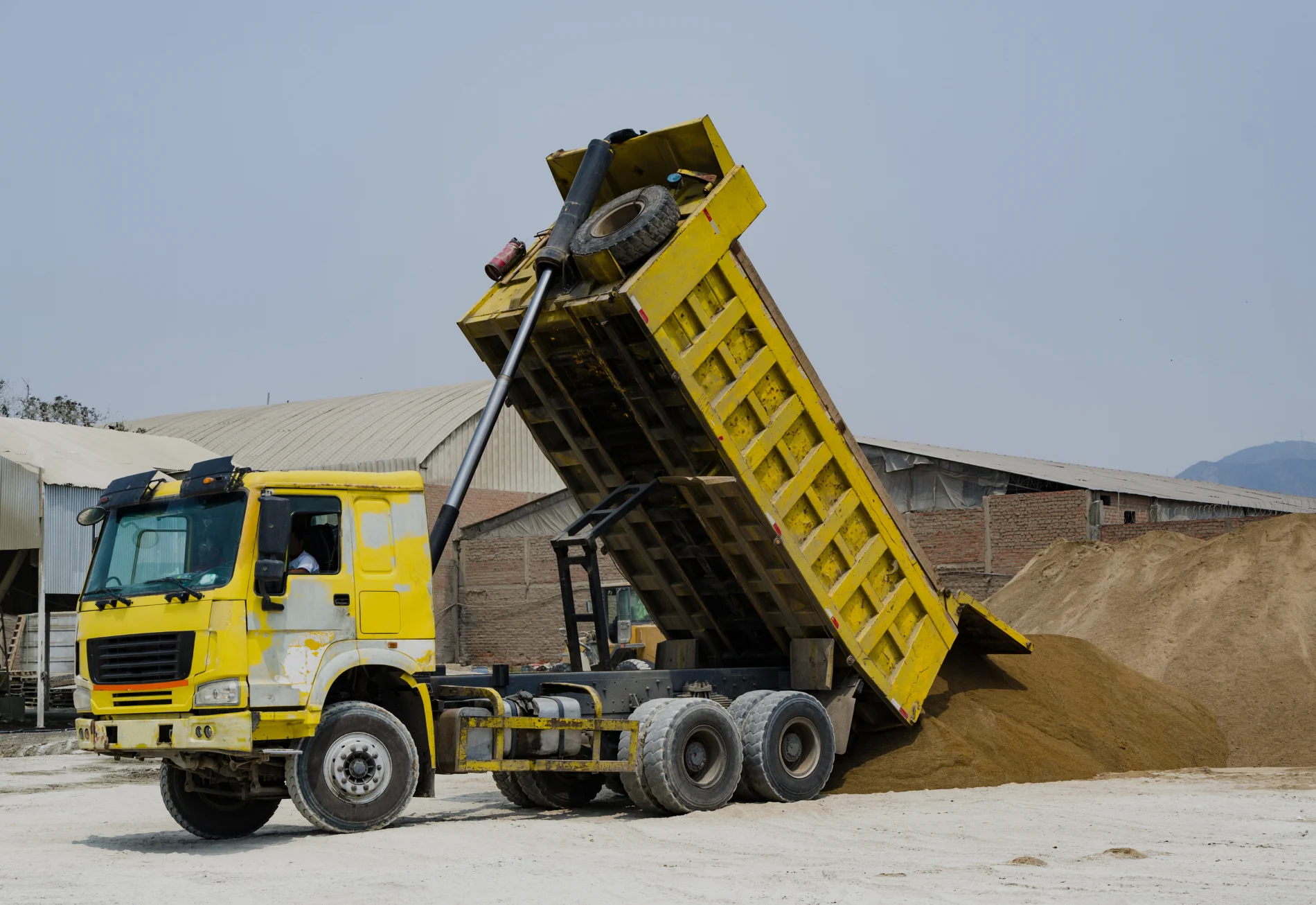Dump Truck Unloading Sand