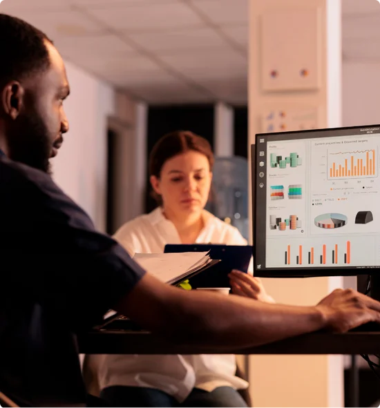 man checking revenue in computer